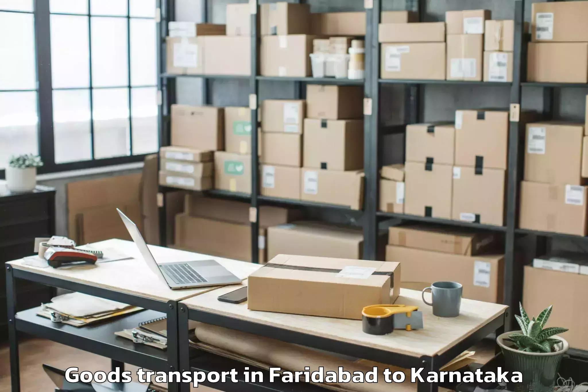 Trusted Faridabad to Kushalnagar Goods Transport